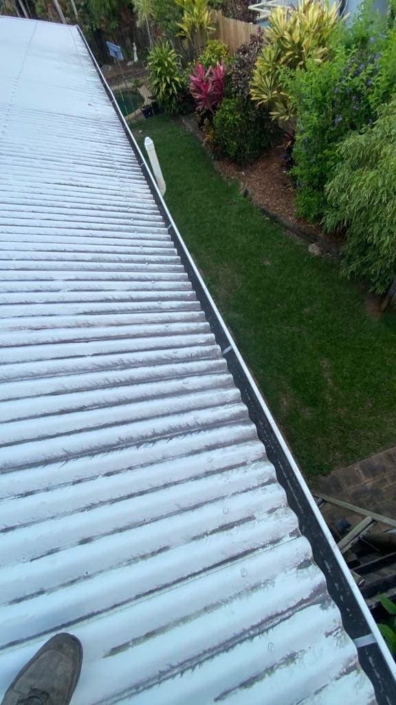 Cleared gutter running the full length of a house roofline