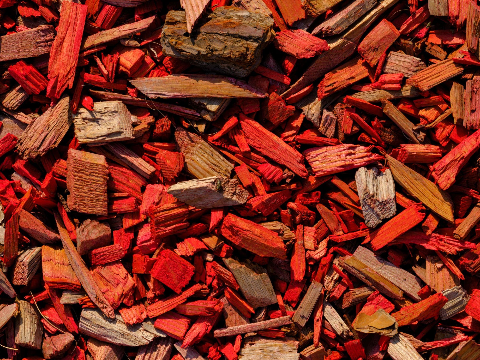 Close view of a red-toned wood mulch